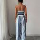 👗 49% OFF NOW! 💥 Geometric Jumpsuit with Halter Neckline & Side Slit – Unique print & elastic back – Versatile, perfect for summer parties or resort wear ✨